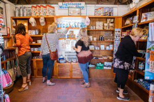 women shopping at the Cape May Lighthouse Museum gift shop