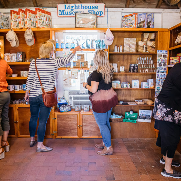 Lighthouse gift shop women shopping at the Cape May Lighthouse Museum gift shop
