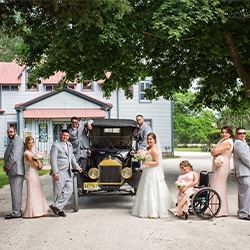 Wedding-alesha-model t-group-250×250 wedding party posing with emlen physicks model t car for a photo out side the carriage house on the grounds of emlen physick estate