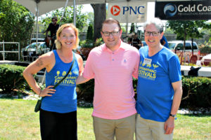three staff members enjoying the cape may mac Craft beer, Music & Crab Festival