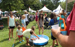 kids playing with bubbles at the kids crafts station at the cape may mac Craft beer, Music & Crab Festival