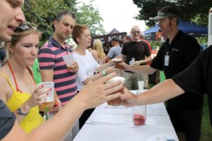 people buying beers at the cape may mac Hops Festival