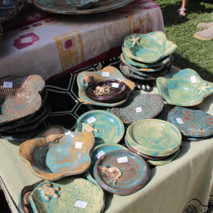 Crafts & Collectibles 2 600×600 pottery table set up at a cape may mac festivals events