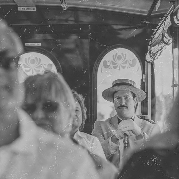 Ghost like photo of victorian man riding trolley