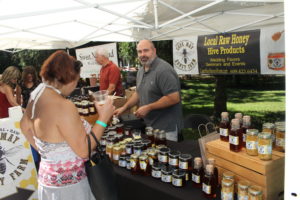 Cape May Honey Farm Owner at his booth at the Harvest Brew Fest in Cape May New Jersey