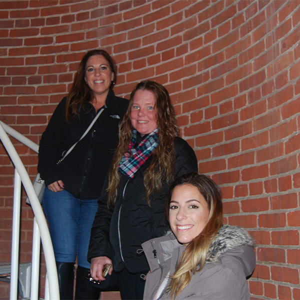 three women enjoying National Lighthouse Day