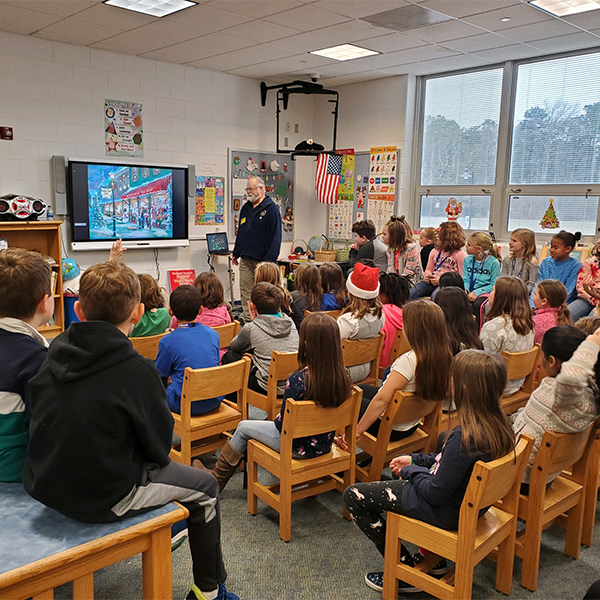 Cape May MAC Museum educator giving a education program to a full classroom of children