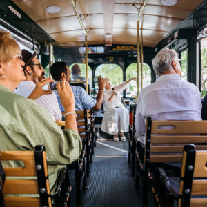 group on a trolley tour taking photos and looking at the sites in cape may new jersey