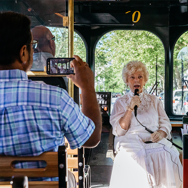 Woman giving trolley tour