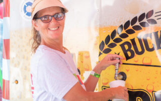 woman pouring a beer