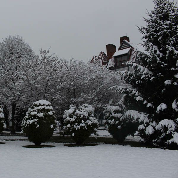 victorian house in the snow